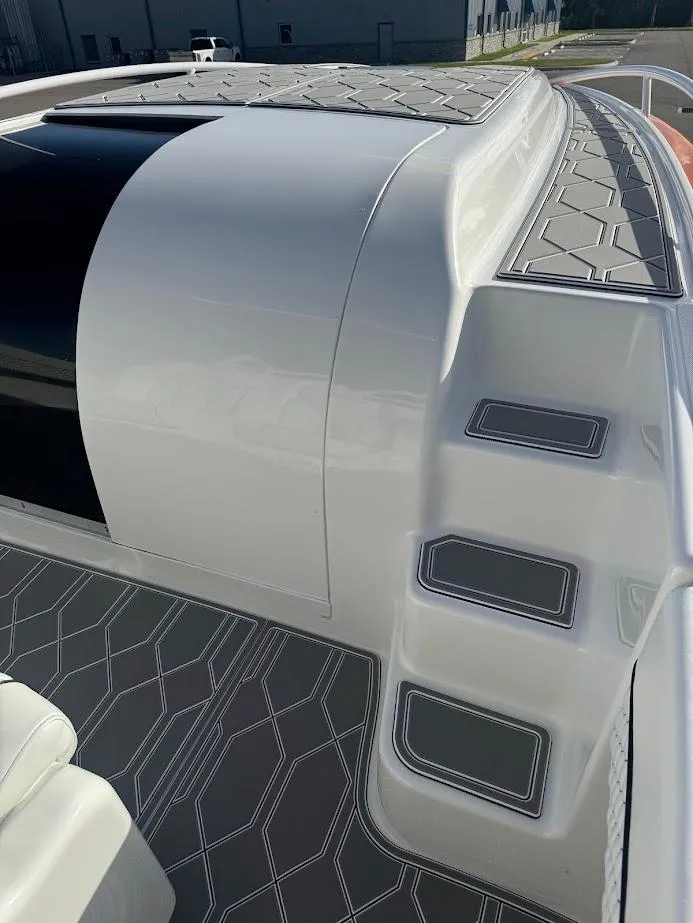 Slide: The Image of 2015 Deep Impact 399 Cabin boat with sleek design and modern detailing. - 26