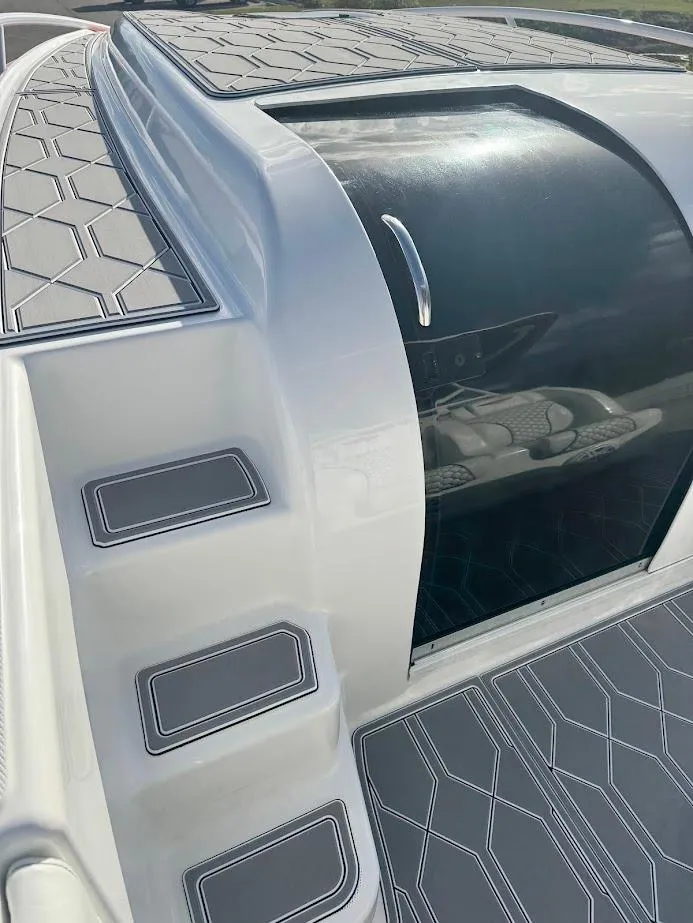 Slide: The Image of 2015 Deep Impact 399 Cabin boat with sleek design and modern detailing. - 27