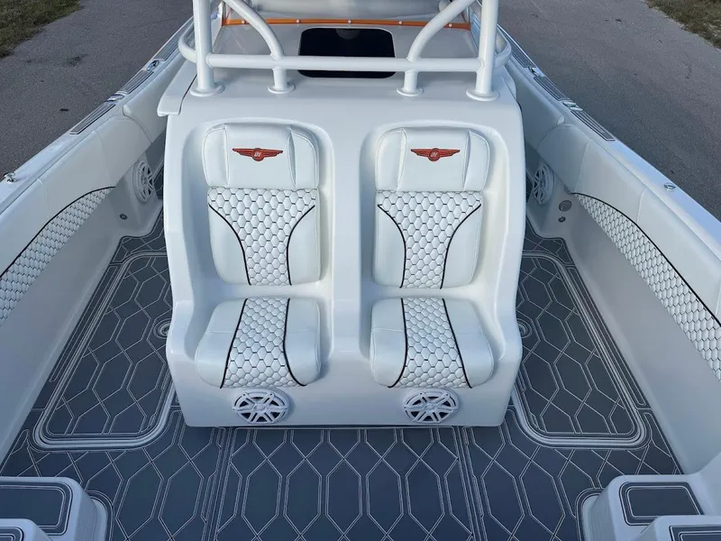 Slide: The Image of 2015 Deep Impact 399 Cabin boat interior with stylish seating and modern design. - 30