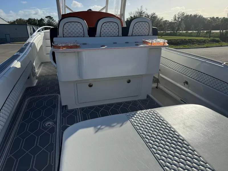 Slide: The Image of 2015 Deep Impact 399 Cabin interior with stylish seating and modern design. - 38