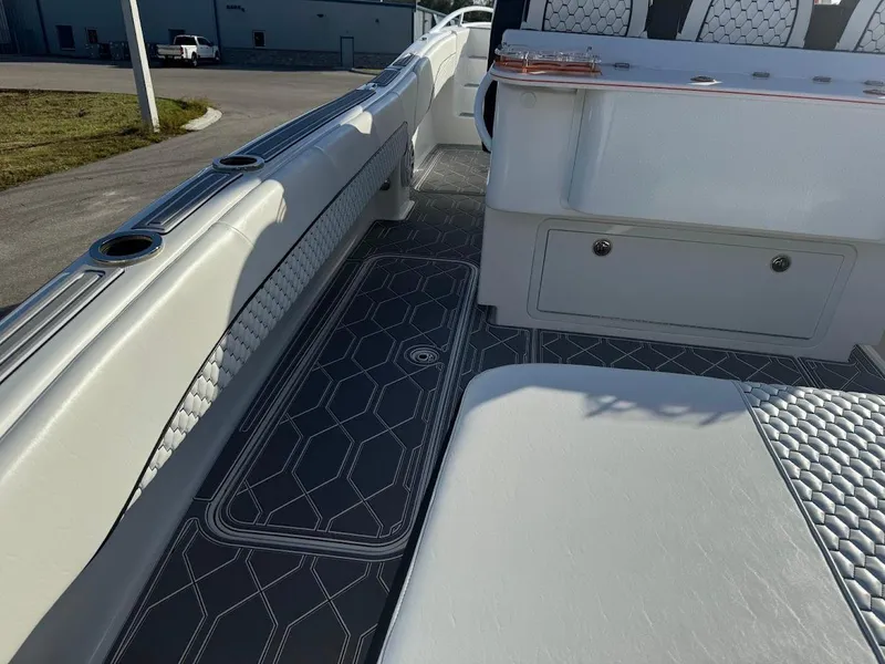 Slide: The Image of 2015 Deep Impact 399 Cabin interior with sleek seating and modern design. - 39