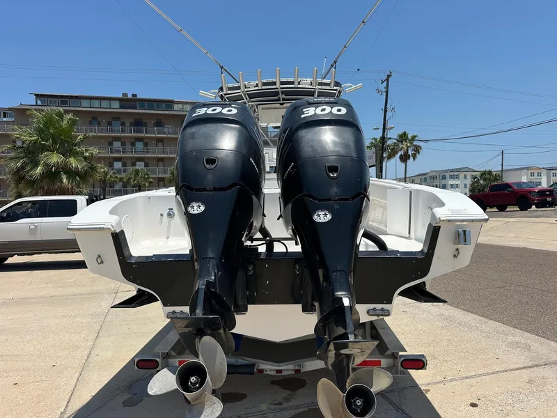 Slide: The Image of 2008 Fountain Center Console boat with dual 300 horsepower engines on a trailer. - 3