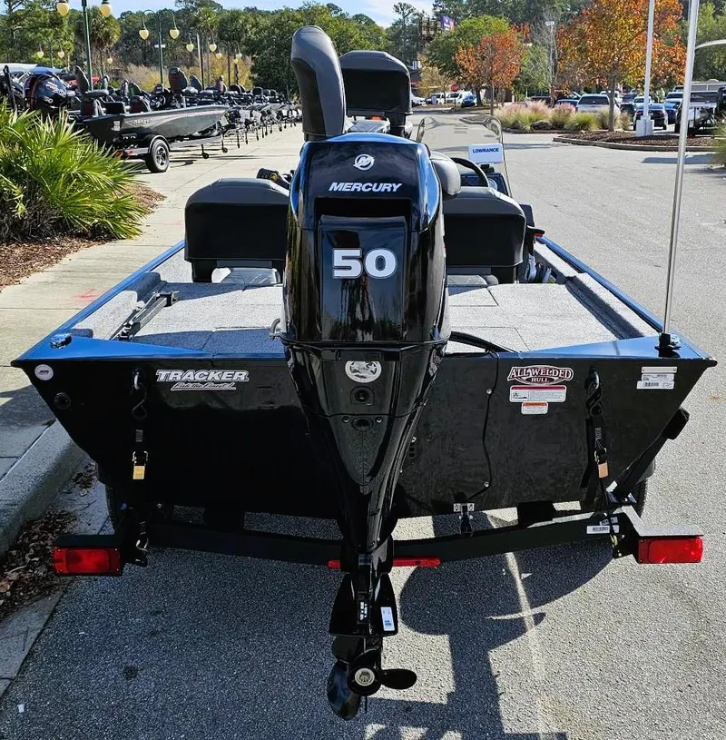 Slide: The Image of 2025 Tracker Bass Tracker Classic XL with Mercury 50 engine, parked outdoors. - 3