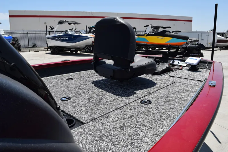 Slide: The Image of 2025 Tracker Pro Team 175 boat with a spacious deck and seating. - 5