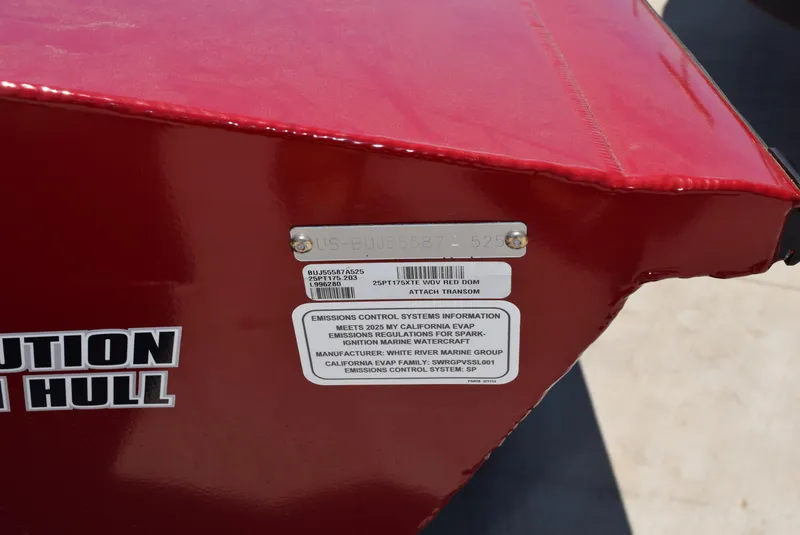 Slide: The Image of 2025 Tracker Pro Team 175 boat hull with emission control information label. - 9