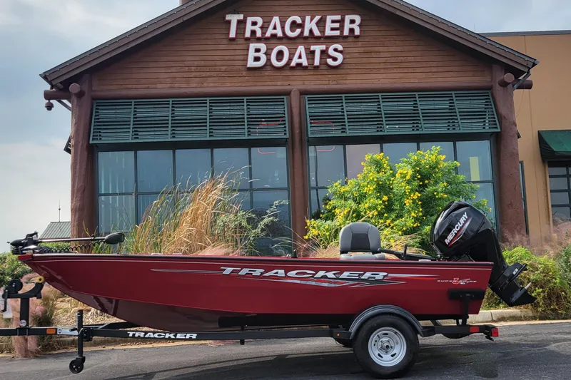 The Image of 2025 Tracker Super Guide V-16 T boat displayed outside Tracker Boats store. - 0