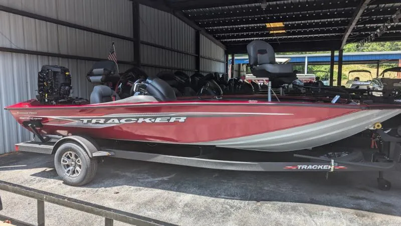 The Image of 2025 Tracker Pro Team 195 Tournament Edition boat in a covered storage area. - 0