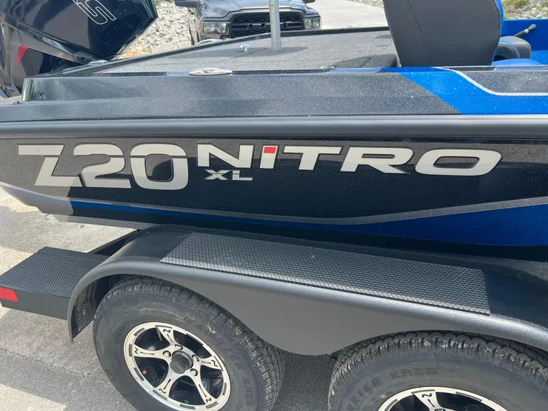 Slide: The Image of 2025 Nitro Z20 XL boat trailer with logo and tire detail. - 11