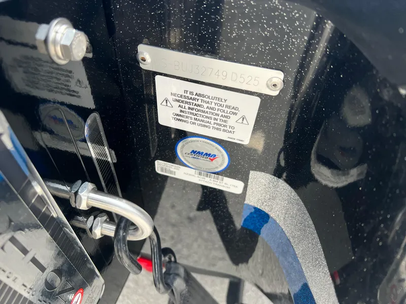 Slide: The Image of Close-up of a 2025 Nitro Z20 XL boat identification plate and safety instructions. - 12