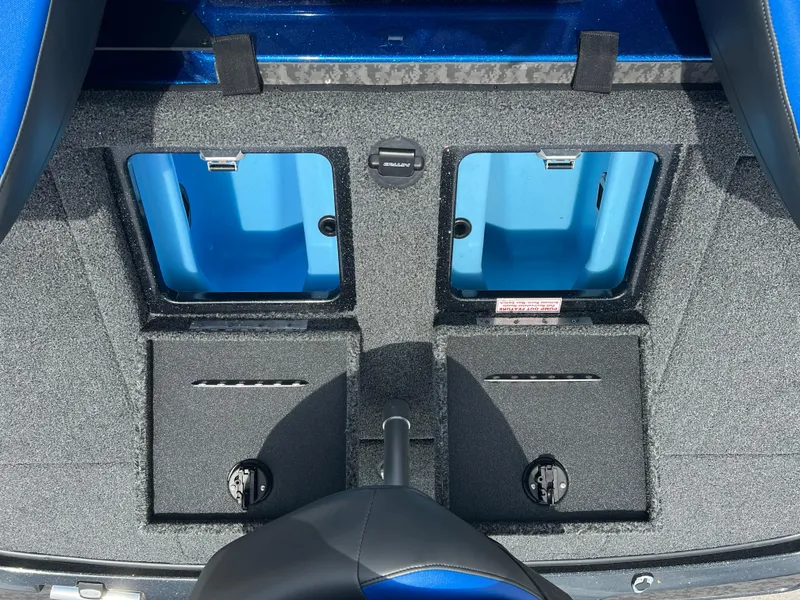 Slide: The Image of Interior storage compartments of 2025 Nitro Z20 XL boat, featuring blue and gray design. - 8