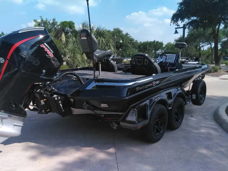 Slide: The Image of 2025 Ranger Z521R Cup-Equipped boat with powerful engine, parked outdoors. - 3