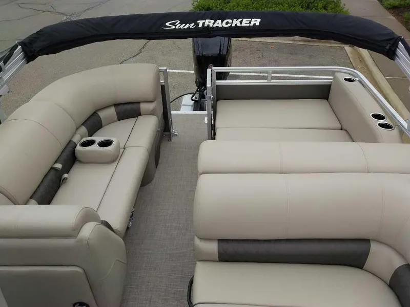 Slide: The Image of 2025 Sun Tracker Party Barge 22 RF DLX with spacious seating and cup holders. - 3