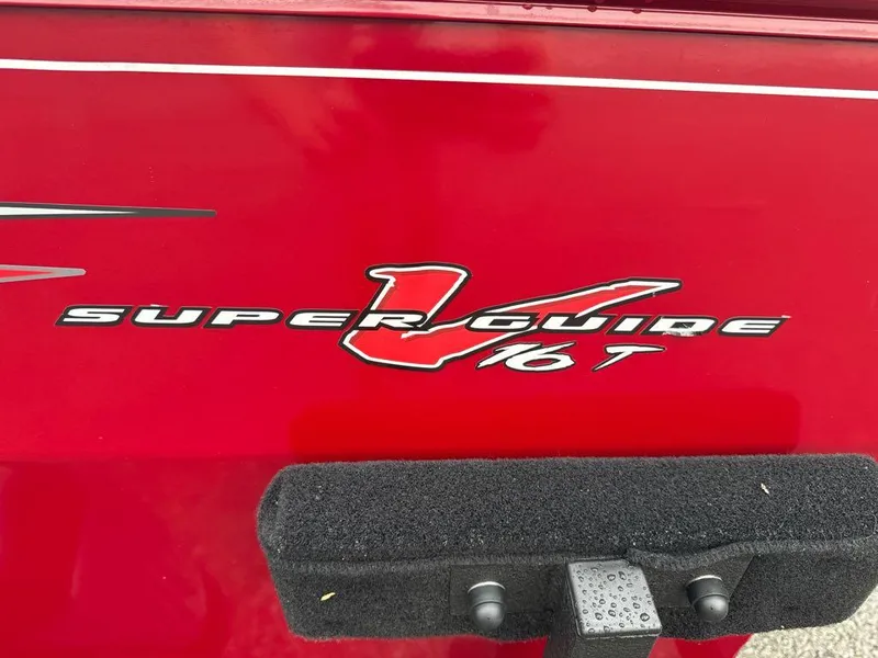 Slide: The Image of Red Tracker Super Guide V-16 T boat logo, 2025 model. - 2