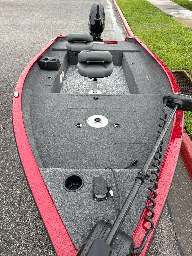 Slide: The Image of 2025 Tracker Super Guide V-16 T fishing boat with dual seats and trolling motor. - 3