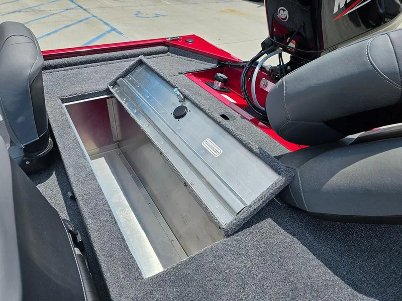Slide: The Image of 2025 Tracker Pro 170 boat interior with open storage compartment and seating. - 10