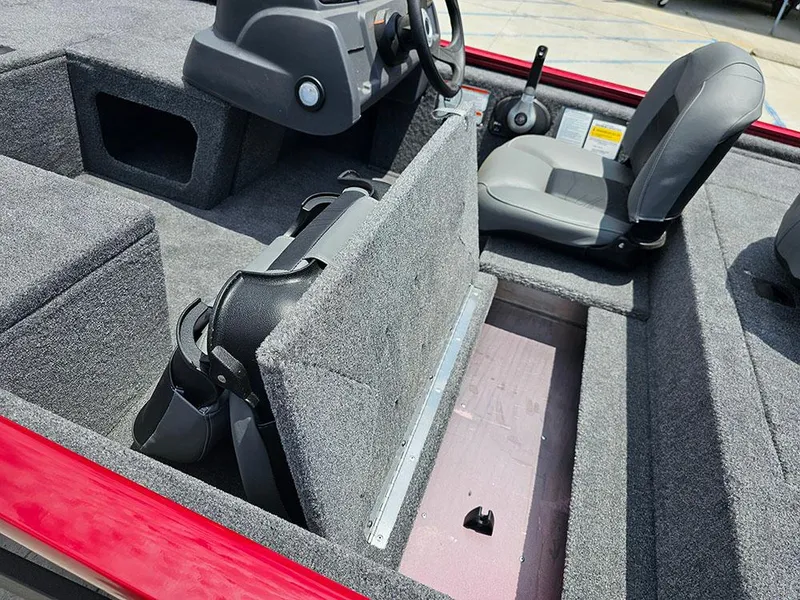Slide: The Image of 2025 Tracker Pro 170 boat interior with gray seating and storage compartments. - 13
