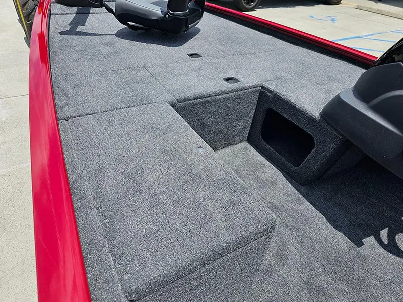 Slide: The Image of 2025 Tracker Pro 170 boat interior with gray carpet and seating. - 14