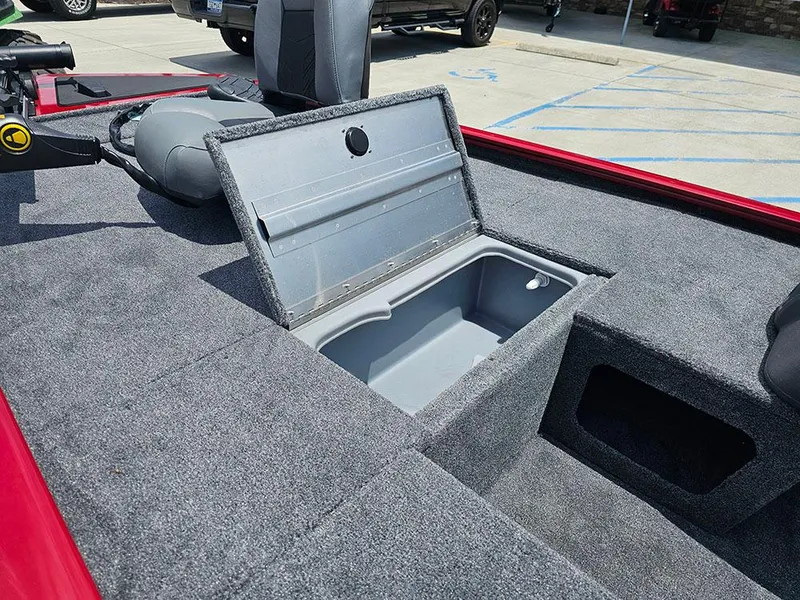 Slide: The Image of 2025 Tracker Pro 170 boat with open storage compartment on deck. - 17