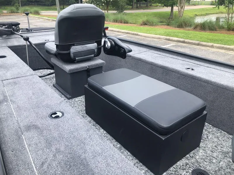 Slide: The Image of 2025 Tracker Panfish 17 boat interior with seating and storage compartments. - 11