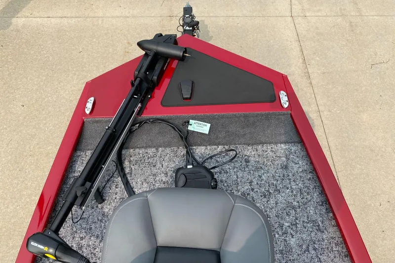 Slide: The Image of 2025 Tracker Pro 170 boat with red deck and gray seating. - 3