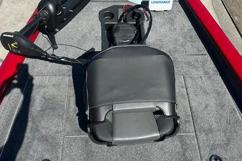 Slide: The Image of 2025 Tracker Pro Team 175 boat interior with seat and fishing equipment. - 4