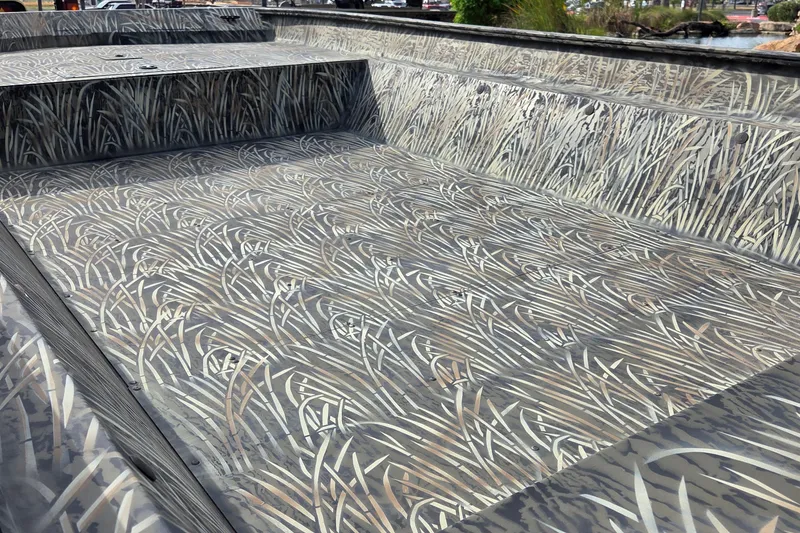 Slide: The Image of 2025 Tracker Grizzly 2072 Utility boat with camouflage interior design pattern. - 14