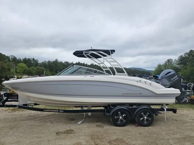 Slide: The Image of 2023 Chaparral 23 SSi OB boat on trailer, side view, outdoors. - 8