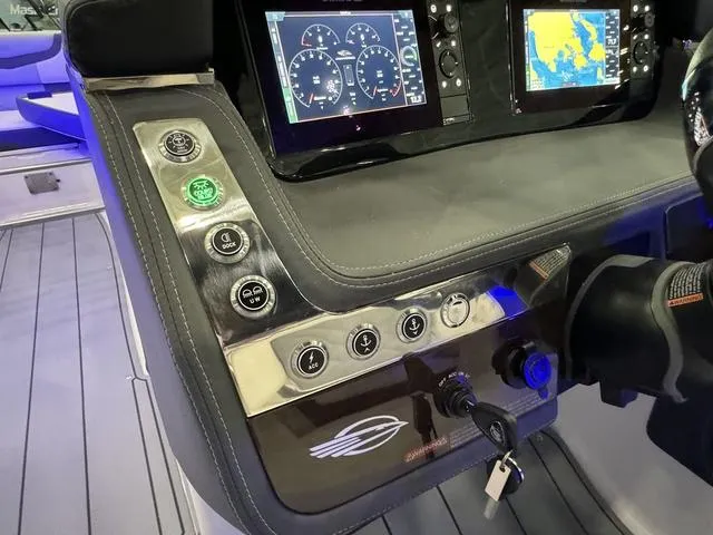 Slide: The Image of 2024 Chaparral 307 SSX dashboard with modern controls and navigation displays. - 15