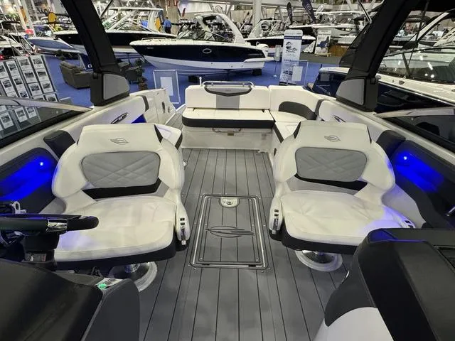 Slide: The Image of 2024 Chaparral 307 SSX boat interior with luxurious seating and modern design. - 8