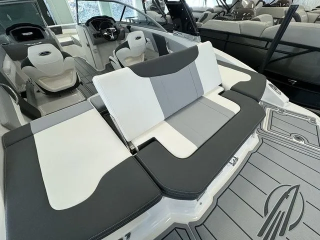 Slide: The Image of 2024 Chaparral 21 SSi boat interior with stylish seating and modern design. - 10