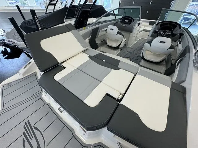 Slide: The Image of 2024 Chaparral 21 SSi boat interior with sleek seating and modern design. - 11