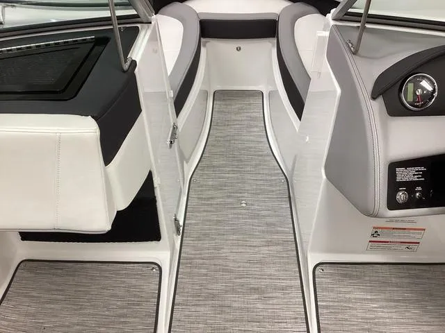 Slide: The Image of 2024 Cobalt 220S boat interior with sleek seating and modern design. - 7