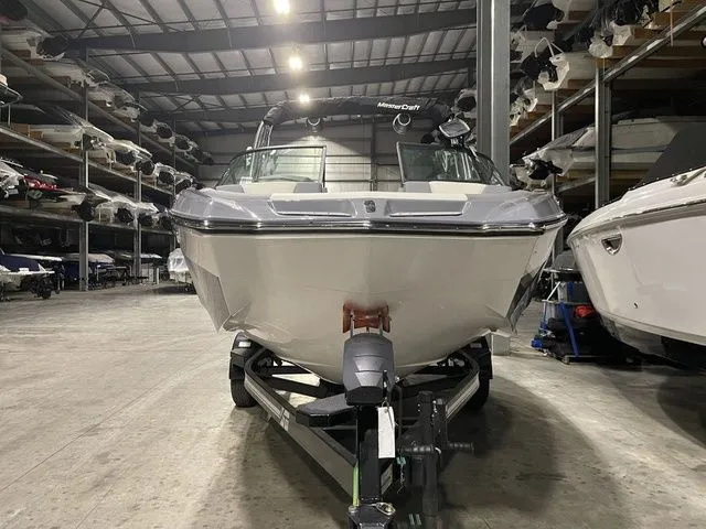 Slide: The Image of 2024 MasterCraft XT20 boat in storage facility, front view. - 4