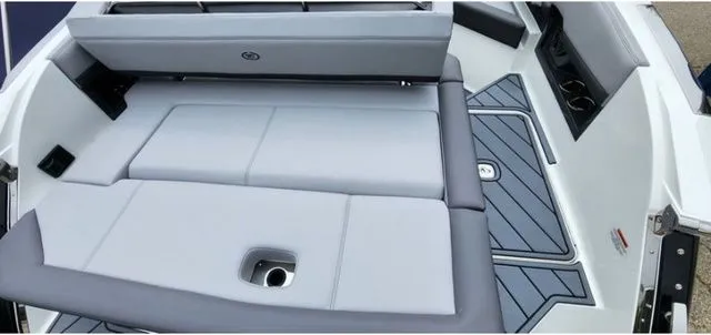 Slide: The Image of 2024 Cobalt R8 boat interior with gray seating and sleek design. - 4
