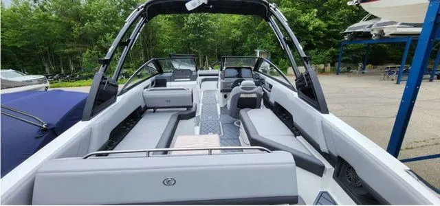Slide: The Image of 2024 Cobalt R8 boat interior with sleek seating and modern design. - 5