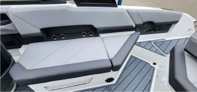 Slide: The Image of 2024 Cobalt R8 boat interior with gray seating and modern design elements. - 6