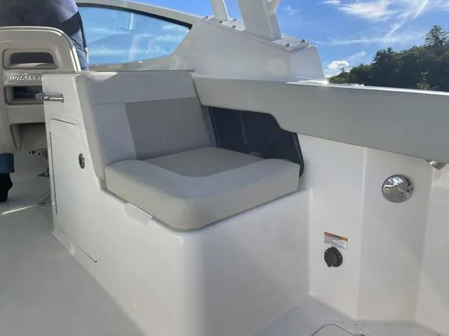 Slide: The Image of 2024 Boston Whaler 280 Vantage interior seating with sleek design and modern features. - 18