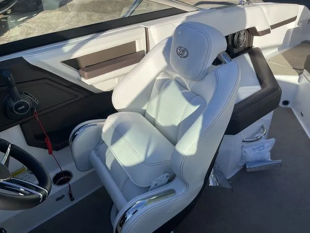 Slide: The Image of Luxurious white captain's seat in 2022 Cobalt R4 boat cockpit. - 20