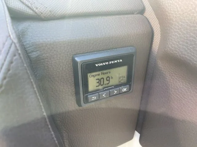 Slide: The Image of Digital display showing 30.9 engine hours on a 2022 Cobalt R4 boat. - 9