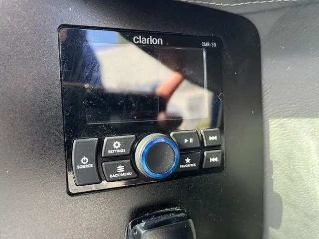 Slide: The Image of Clarion CMR-30 audio system in 2023 Chaparral 247 SSX boat dashboard. - 18