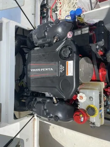 Slide: The Image of Volvo Penta engine in 2022 Cobalt CS23 boat, showcasing detailed components. - 13