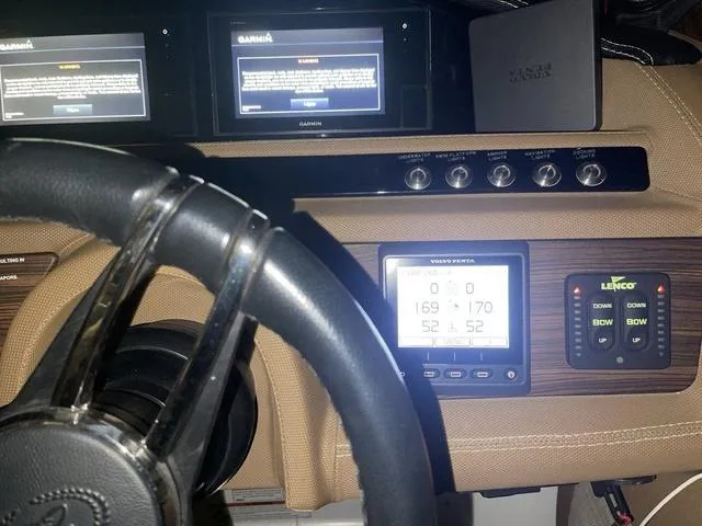Slide: The Image of Dashboard of a 2019 Cobalt R30 boat with Garmin and Volvo Penta displays. - 18