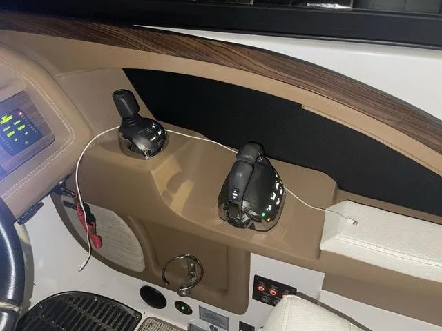 Slide: The Image of Control panel of a 2019 Cobalt R30 boat with joystick and throttle controls. - 20