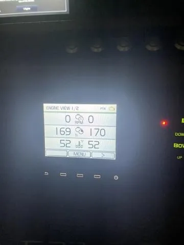 Slide: The Image of Dashboard display of a 2019 Cobalt R30 boat showing engine metrics. - 32