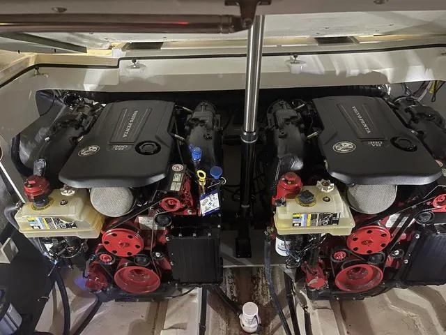 Slide: The Image of Twin engines in a 2019 Cobalt R30 boat, showcasing detailed mechanical components. - 40