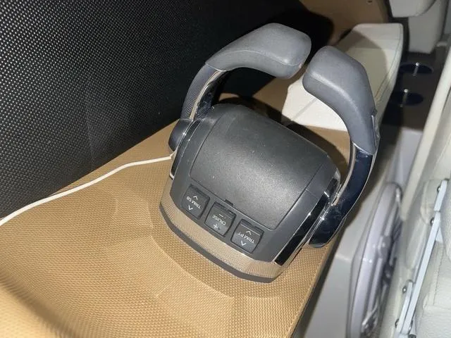 Slide: The Image of Steering wheel of a 2019 Cobalt R30 boat, featuring control buttons. - 48