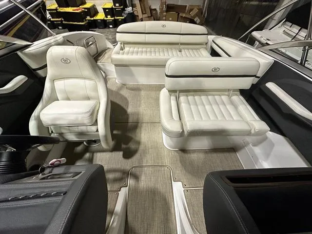 Slide: The Image of 2014 Cobalt R3 boat interior with white leather seating and modern design. - 12
