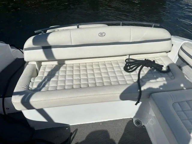 Slide: The Image of 2017 Cobalt R5 boat interior with white cushioned seating and coiled rope. - 6