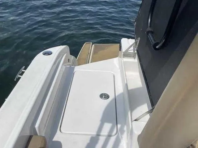 Slide: The Image of 2015 Four Winns H230 boat deck with water view. - 12