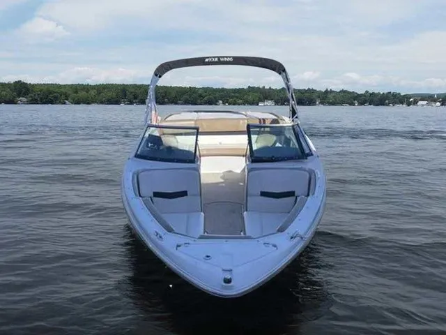 Slide: The Image of 2015 Four Winns H230 boat on a calm lake, front view. - 3